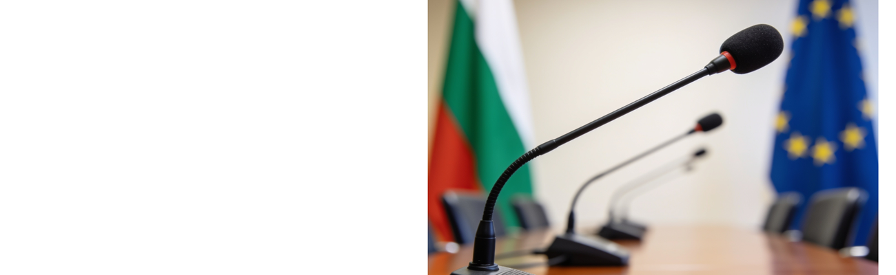Bulgarian and EU flags next to a meeting table with microfones