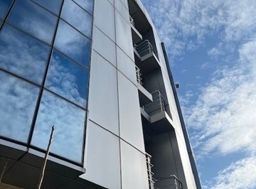 Поземлен имот с площ 834 кв.м в гр. Хасково, ул. „Славянска“ №2 и промишлена сграда