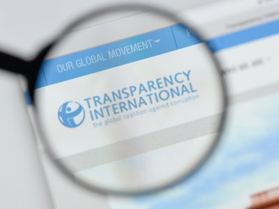 Transparency International website homepage. Transparency International logo visible.