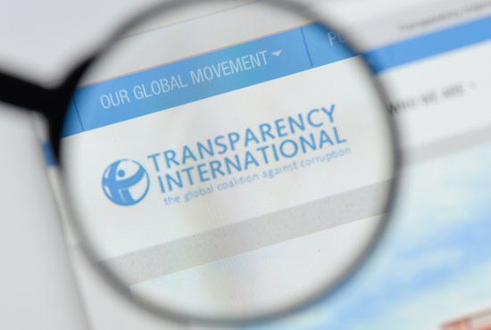 Transparency International website homepage. Transparency International logo visible.