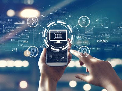 Fintech theme with person using a smartphone