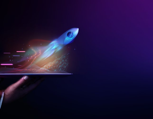 Futuristic Conceptual Photo. Startup Concept. Rocket Take-off and Released from Digital Tablet to Space. Mission to Moon. Symbol of Success