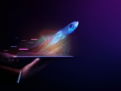Futuristic Conceptual Photo. Startup Concept. Rocket Take-off and Released from Digital Tablet to Space. Mission to Moon. Symbol of Success