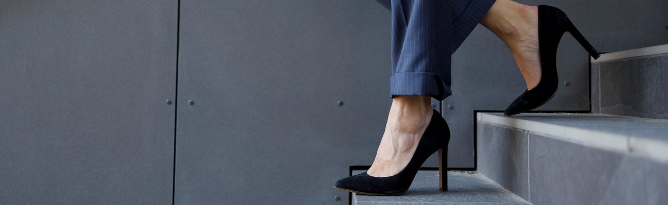 Ladie's feet walking down the stairs